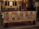 49th Memorial Mass at Holy Family Church on 12/02/07 - the memorial quilt made by Christine Karkoszka Anderson in 2004. (Photo courtesy of Luci Kuziw)